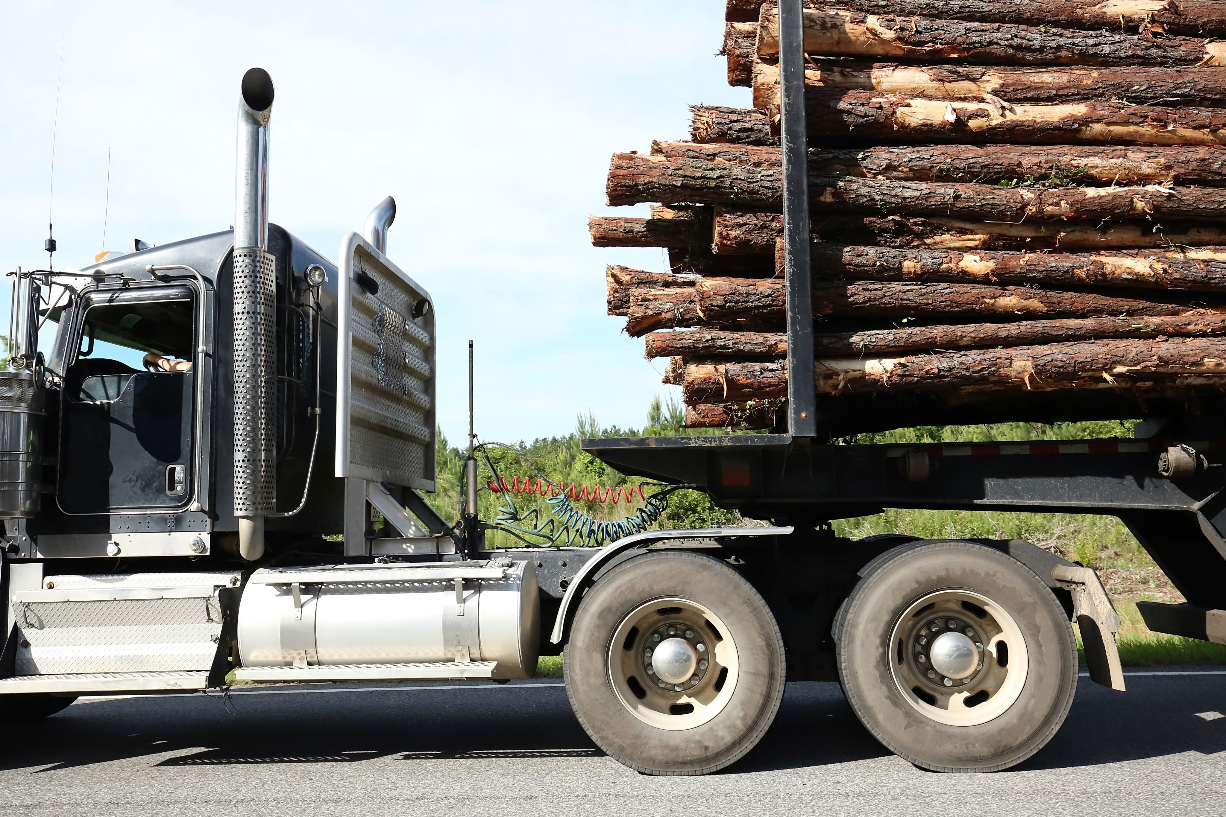 truck pulling timber